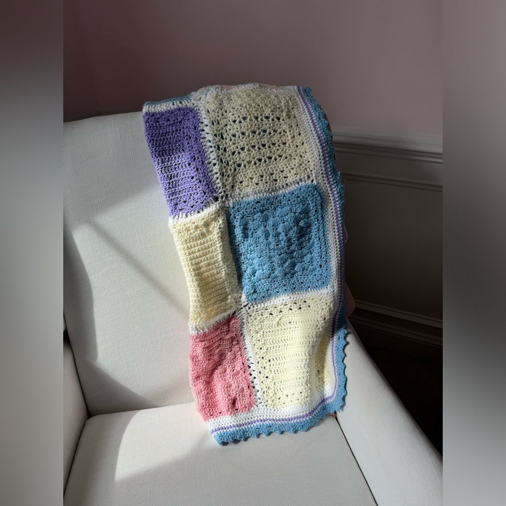 Hand knit baby blanket in pastels